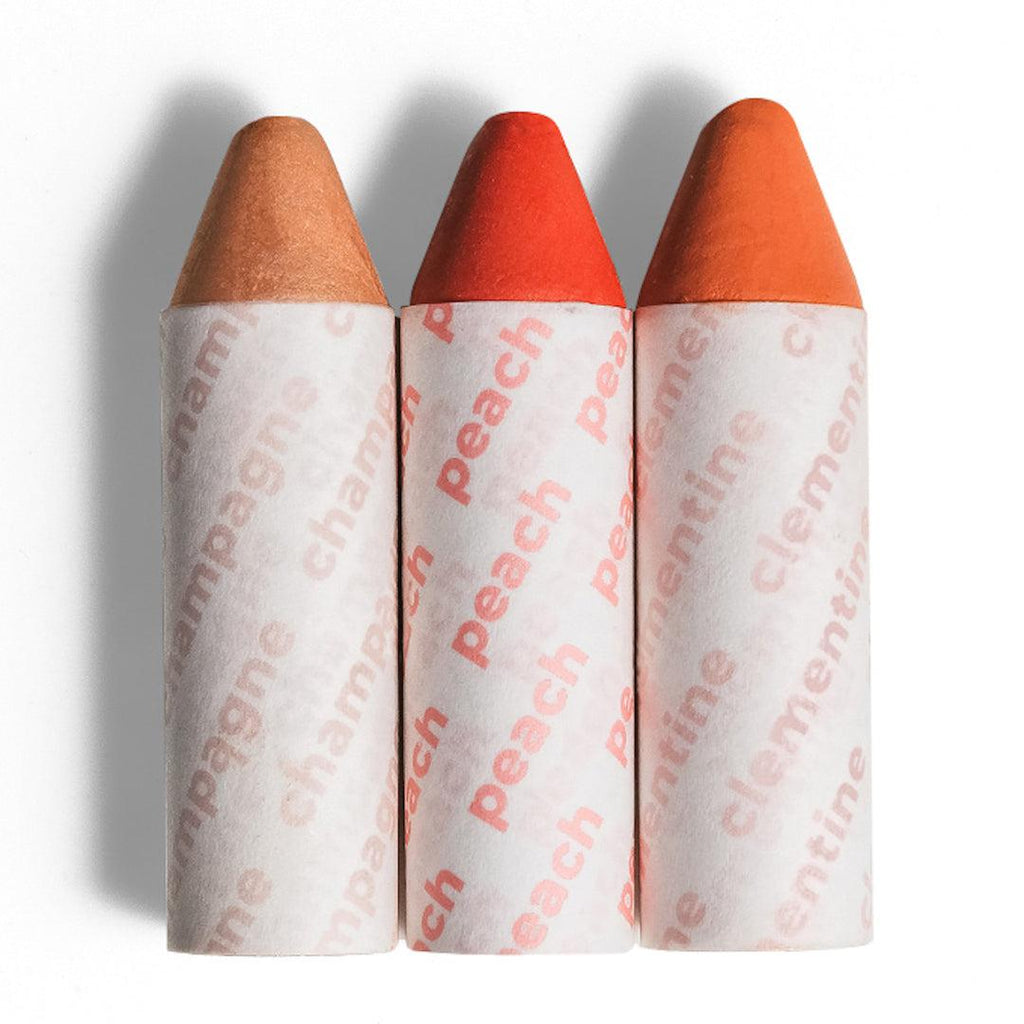 Axiology-Malibu Magic-Makeup-CopyofAXIOLOGYVEGANBALMIESmalibumagicchampagne_peach_clementine-The Detox Market | 